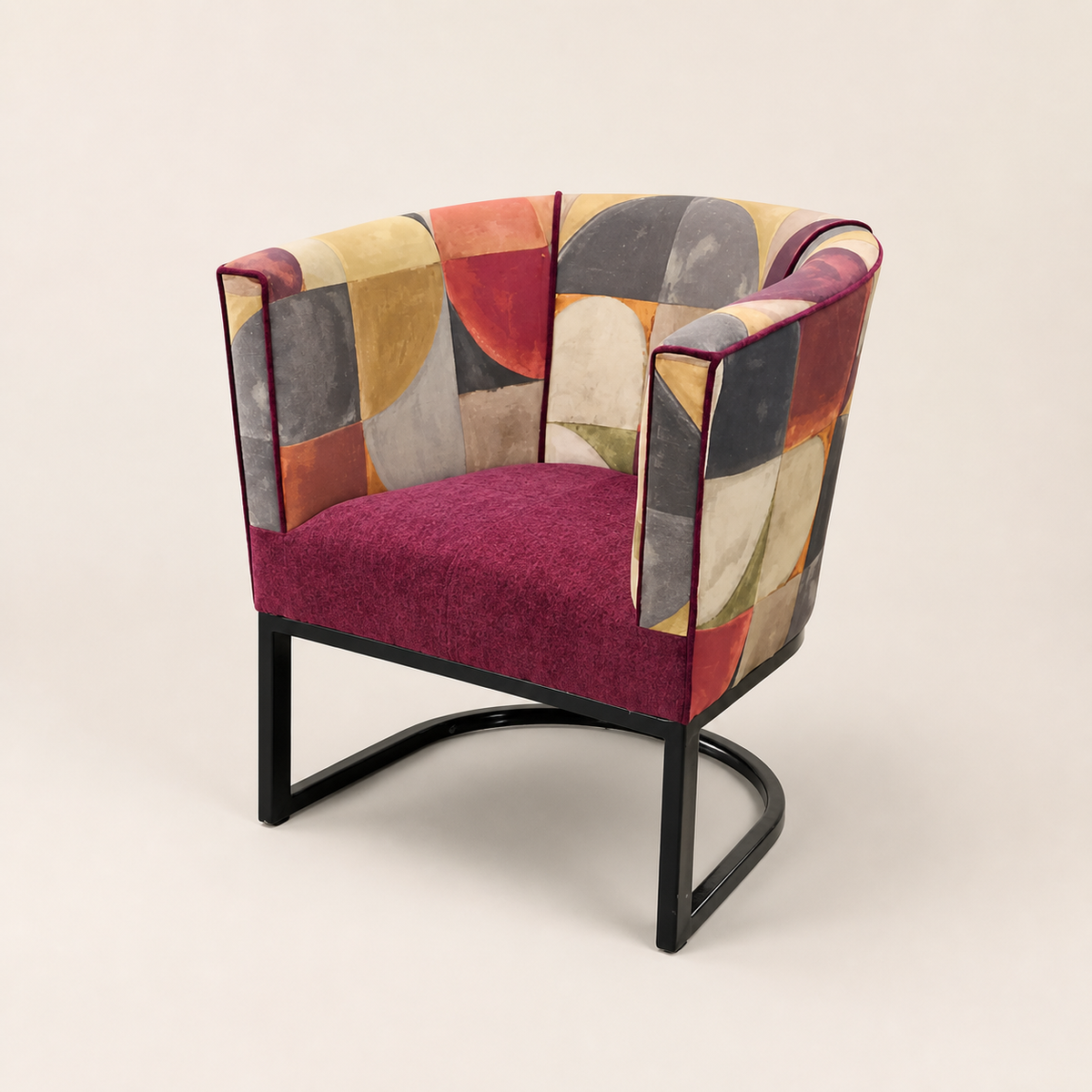Metal tub chair with Stuart Graham Fabric on a warm ivory catalogue background