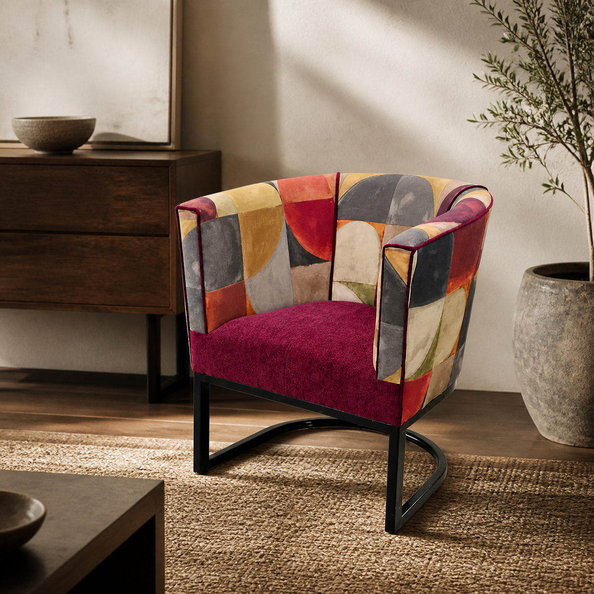 Metal tub chair with Stuart Graham Fabric in a luxury interior