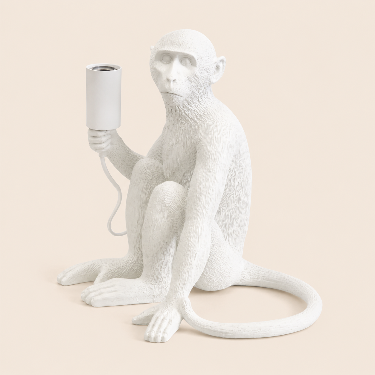 White resin monkey lamp excluding globe on warm beige catalogue background