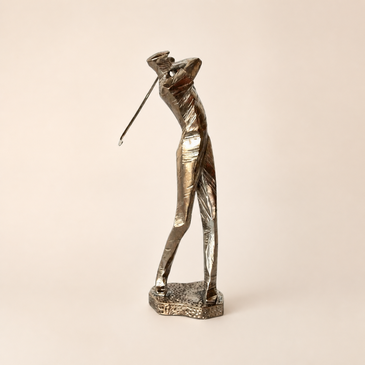 Silver Golfer On Stand on a warm ivory catalogue background