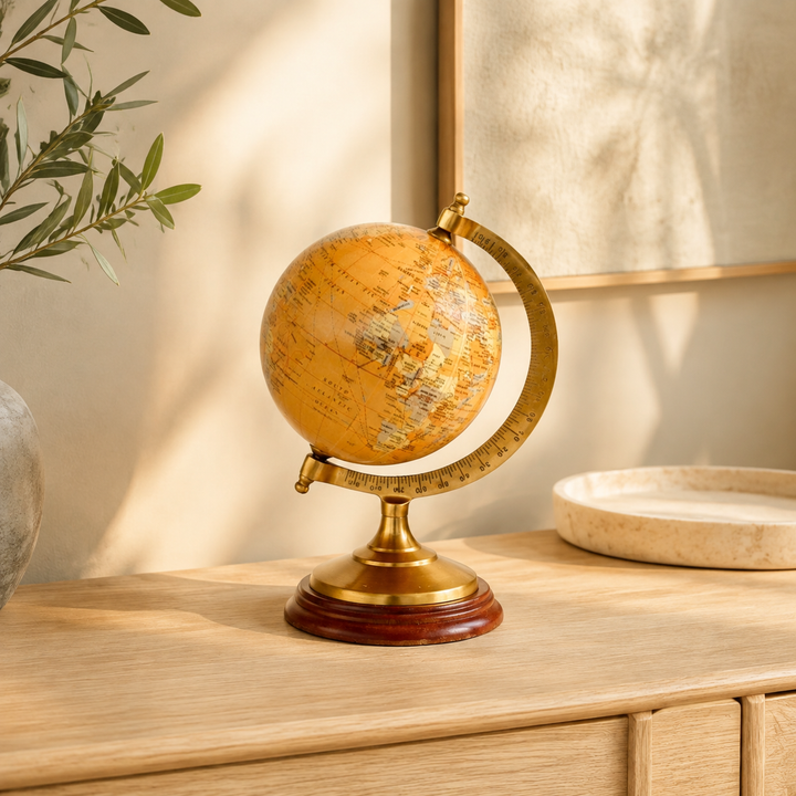 SMALL BRASS &amp; MUSTARD WORLD GLOBE 22X15CM lifestyle view