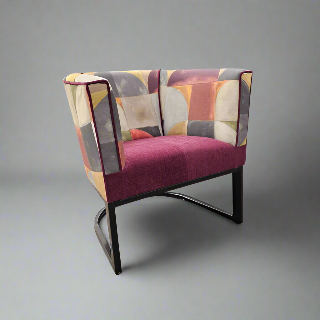 Metal tub chair with Stuart Graham Fabric