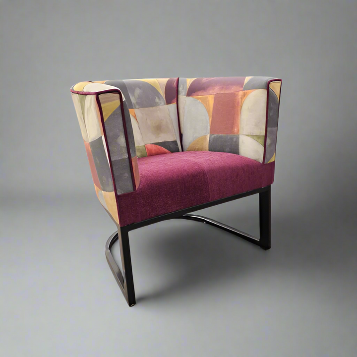 Metal tub chair with Stuart Graham Fabric