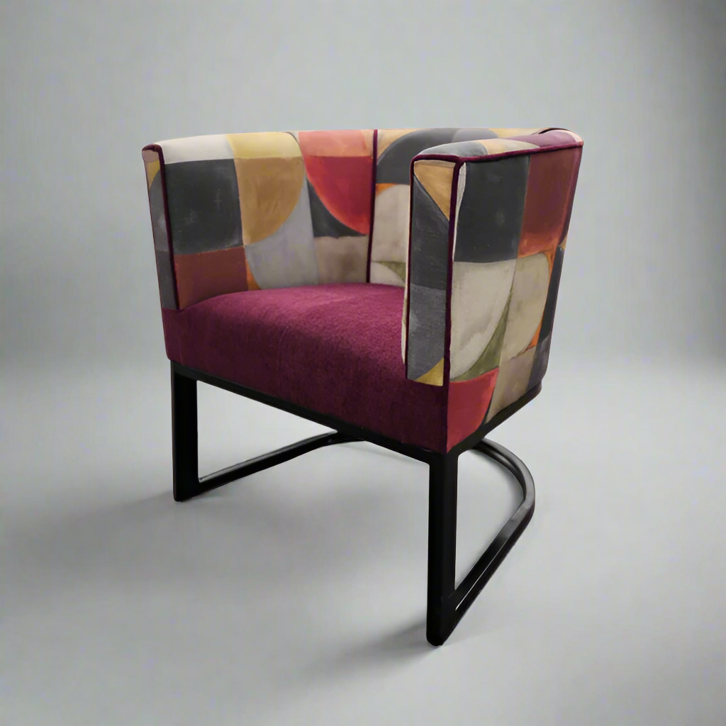 Metal tub chair with Stuart Graham Fabric