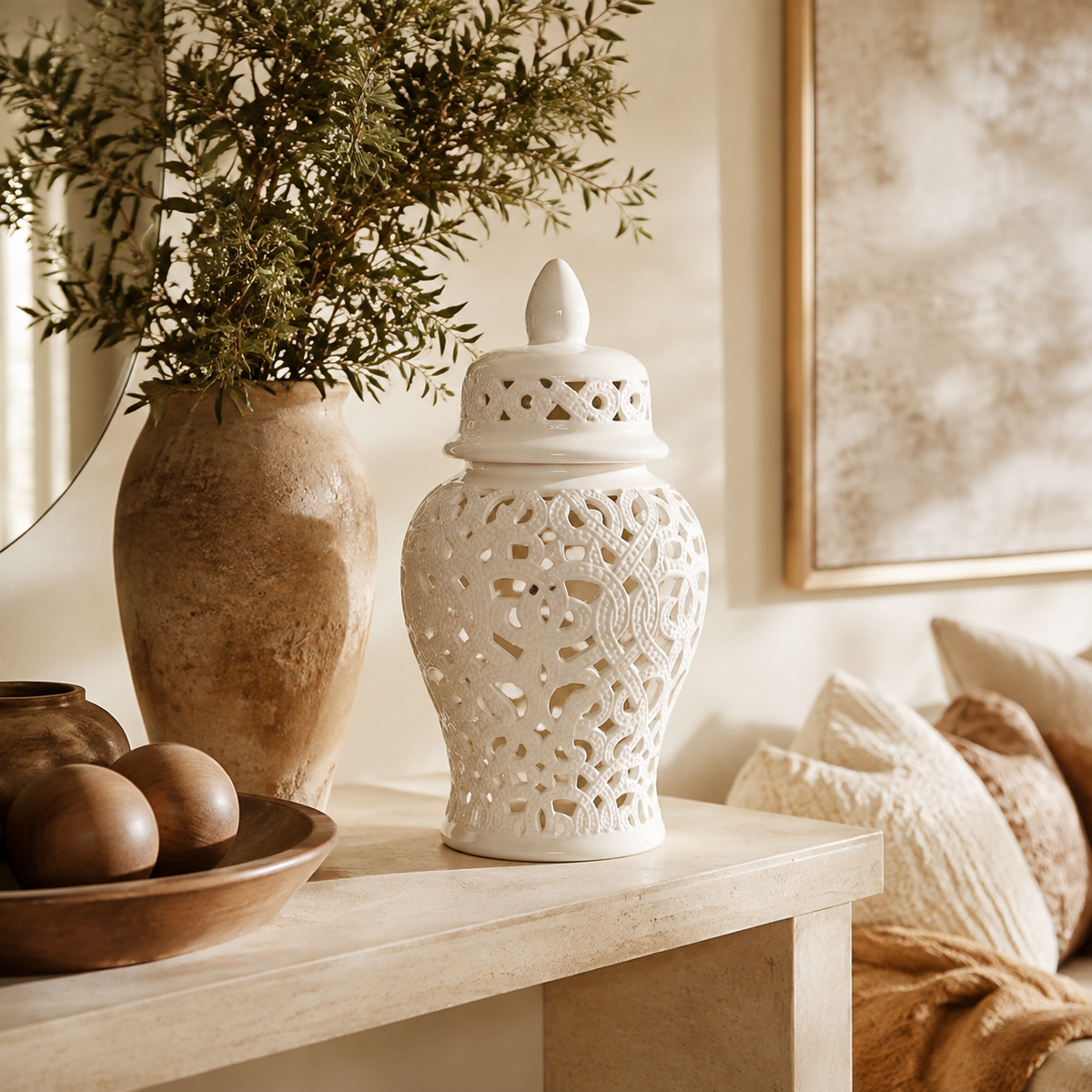White cut-out ginger jar with braided design in warm luxury interior