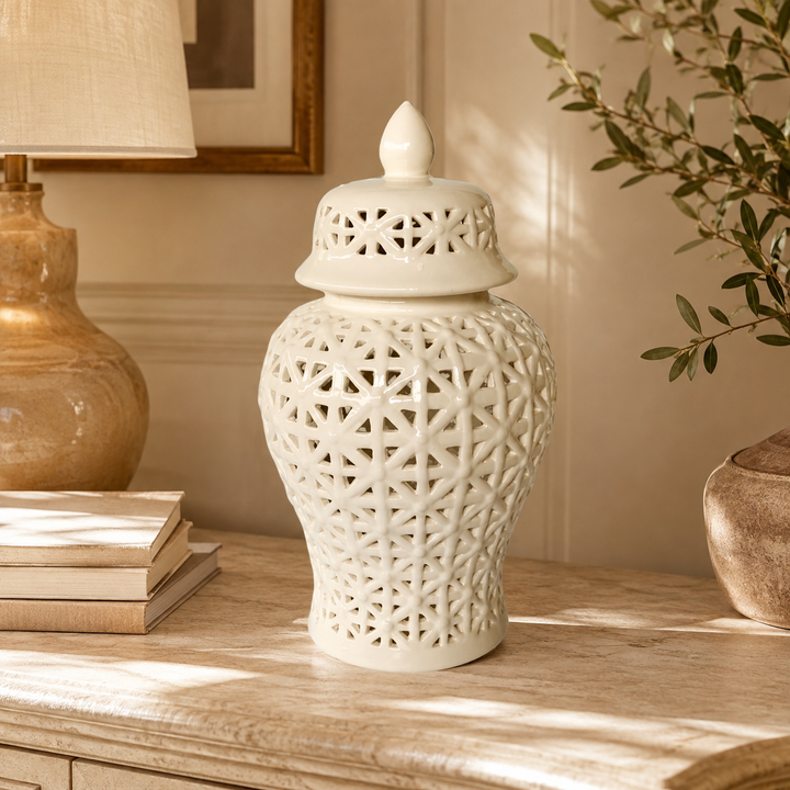 White criss-cross cut-out ginger jar in warm luxury interior