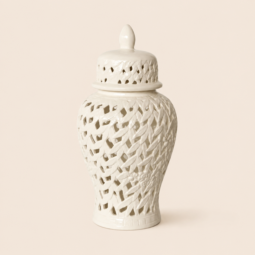 White flower and leaf cut-out ginger jar on warm beige background