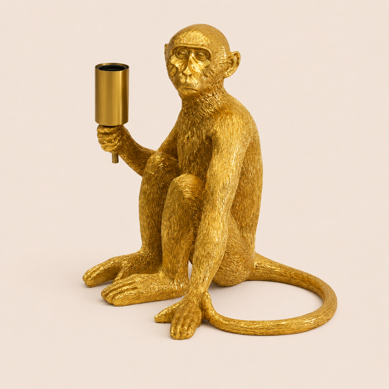 XL gold resin monkey lamp excluding globe on warm beige background