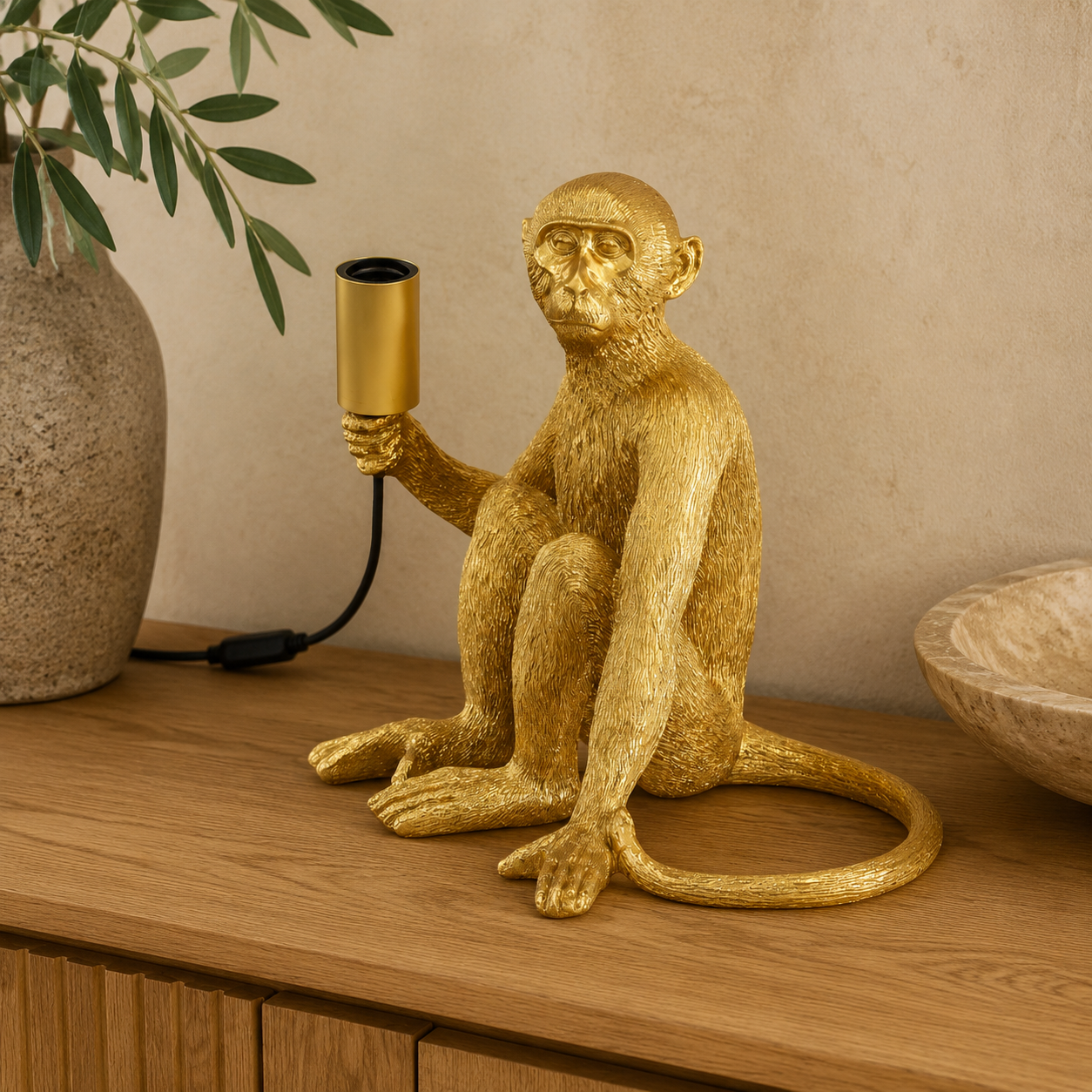 XL gold resin monkey lamp excluding globe in warm luxury interior