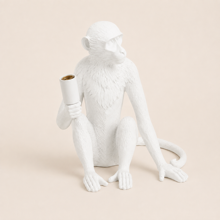 XL white resin monkey lamp excluding globe on warm beige background