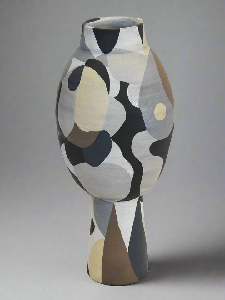 Ceramic Pablo Large Vase
Make a statement in your home or office with the majestic Ceramic Pablo Large Vase, an impressive and exclusive piece that commands attention.
Design Features:
Size: 22cm x 22cm x 50cm (H)
Expertly crafted from high-quality ceramic
Modern design adds sophistication and elegance to any room
Interior Style:
Perfect for living rooms, offices, entryways, and hallways
Complements modern, minimalist, and contemporary interior styles
Adds a touch of drama and flair to any space
