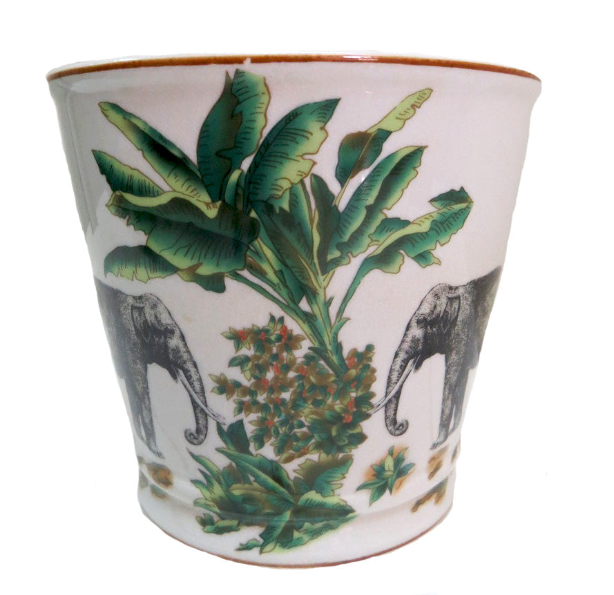 Origins Pot
Tropical Chic Decor Piece
Add a touch of exotic elegance to your home with this stunning Origins Pot. Crafted from high-quality porcelain, it features a vibrant pattern of elephants and palm trees that will transport you to a tropical paradise.
Key Features
Material: High-quality porcelain
Size: 15.5cm (Diameter) x 17cm (Height)
Design: Vibrant pattern of elephants and palm trees
Shop at: Unique Boys