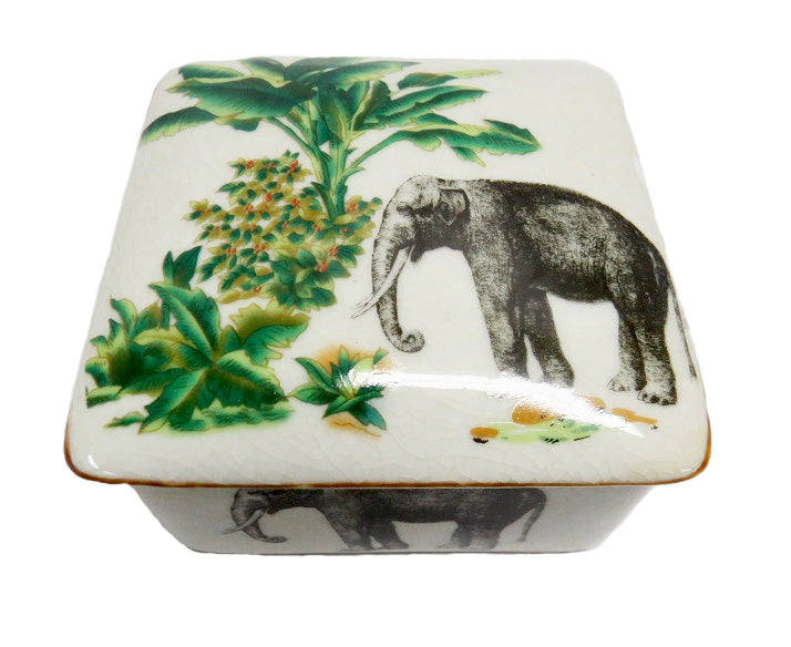 Palm Elephant Box
Unique Ceramic Decor Box
Add a touch of tropical charm to your home with this adorable Palm Elephant Box. Made from ceramic porcelain, it features a delightful square design with an elephant and palm trees.
Key Features
Material: Ceramic porcelain
Size: 11cm (Width) x 6cm (Height)
Design: Elephant and palm trees
Shop at: Unique Boys