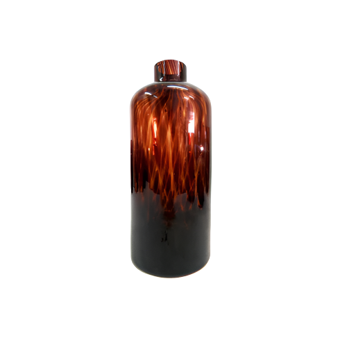 Introducing the Exquisite Oro Vase from Unique Boys
Elevate your home decor with this stunning, one-of-a-kind Oro Vase, expertly crafted with a mesmerizing tortoise shell design glass. Its unique jar/bottle shape adds an air of sophistication, making it a perfect conversation starter for any living space.