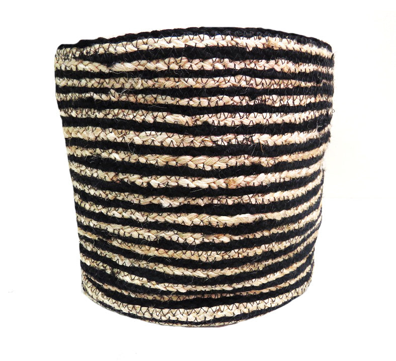 This Twiga basket is the perfect way to add a touch of timeless style to your home. Handmade from jute in narrow black and natural stripes, it's exquisitely constructed for years of use. Measuring 24CMD x 22CMH, its classic look adds a touch of personality to any room.