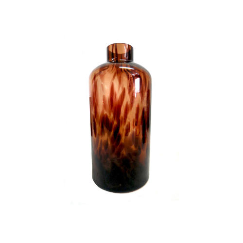 Elevate Your Space with the Exquisite Nuru Vase
Add a touch of sophistication and elegance to your home with the stunning Nuru Vase. This unique, jar-shaped glass container boasts a beautiful tortoise shell design that's sure to impress.